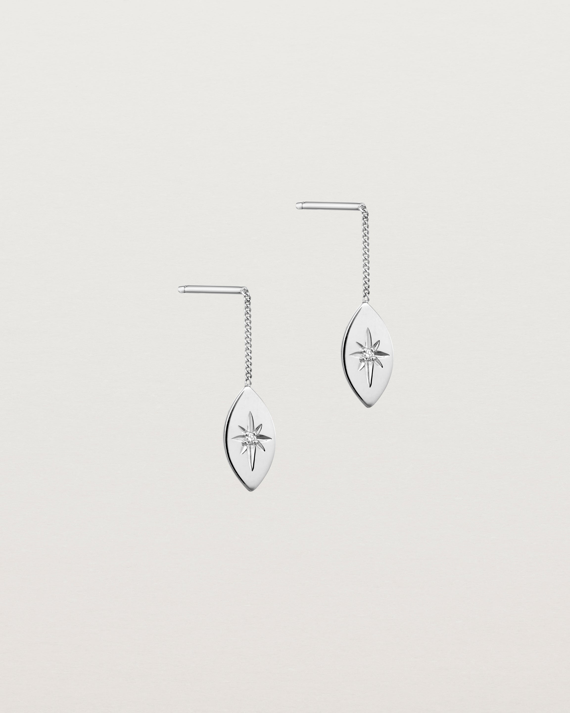 Angled view of the Willow Drop Earrings | Birthstone in white gold with a Diamond.