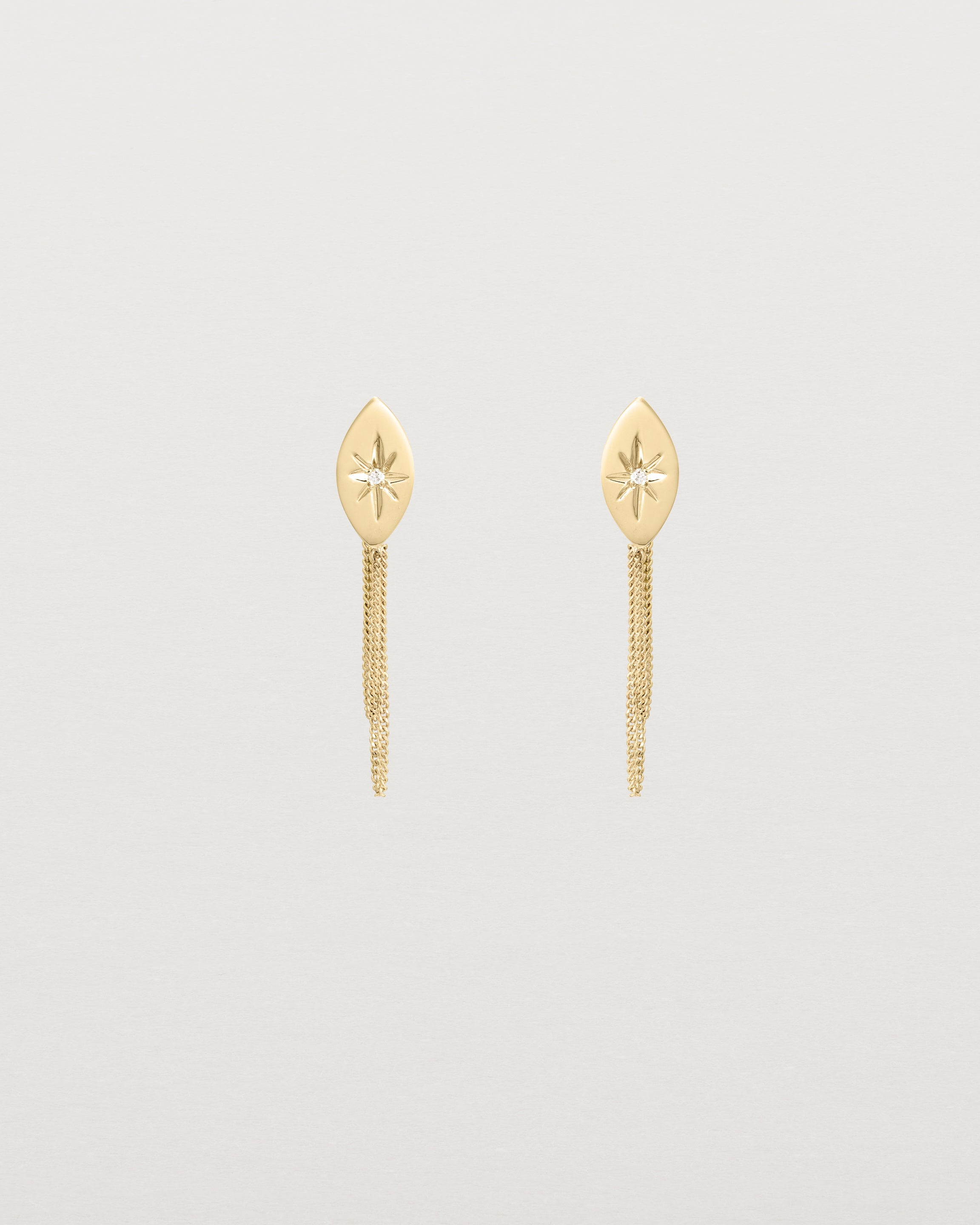 Front view of the Willow Loop Studs | Birthstone in yellow gold with white diamonds.