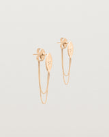 Angled view of the Willow Loop Studs | Birthstone in rose gold with white diamonds.
