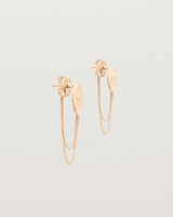 Angled view of the Willow Loop Studs | Birthstone in rose gold with white diamonds.