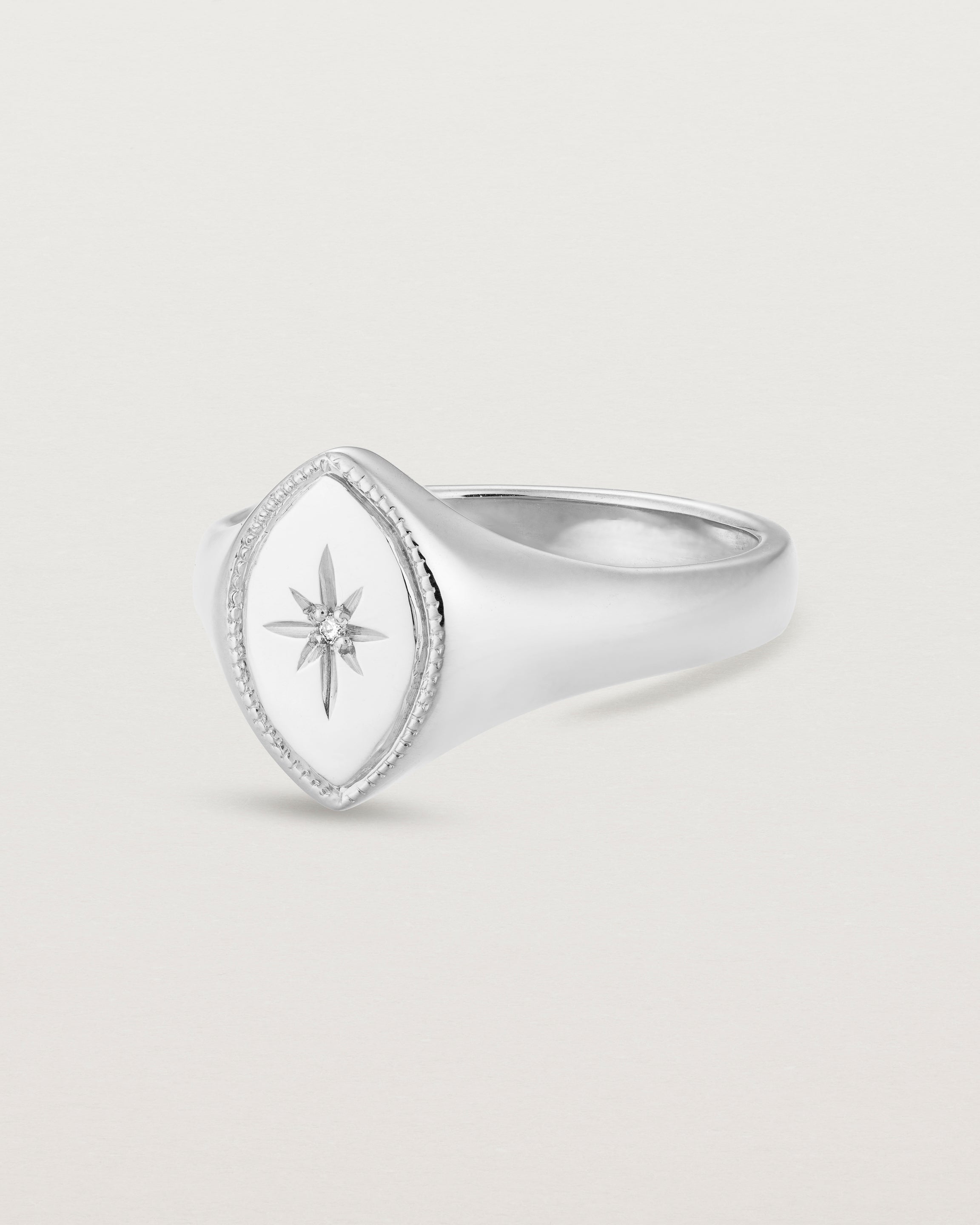 Angled view of the Willow Millgrain Signet Ring | Birthstone in white gold.