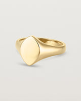 Angled view of the Willow Signet Ring in yellow gold.
