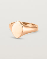 Angled view of the Willow Signet Ring in rose gold.