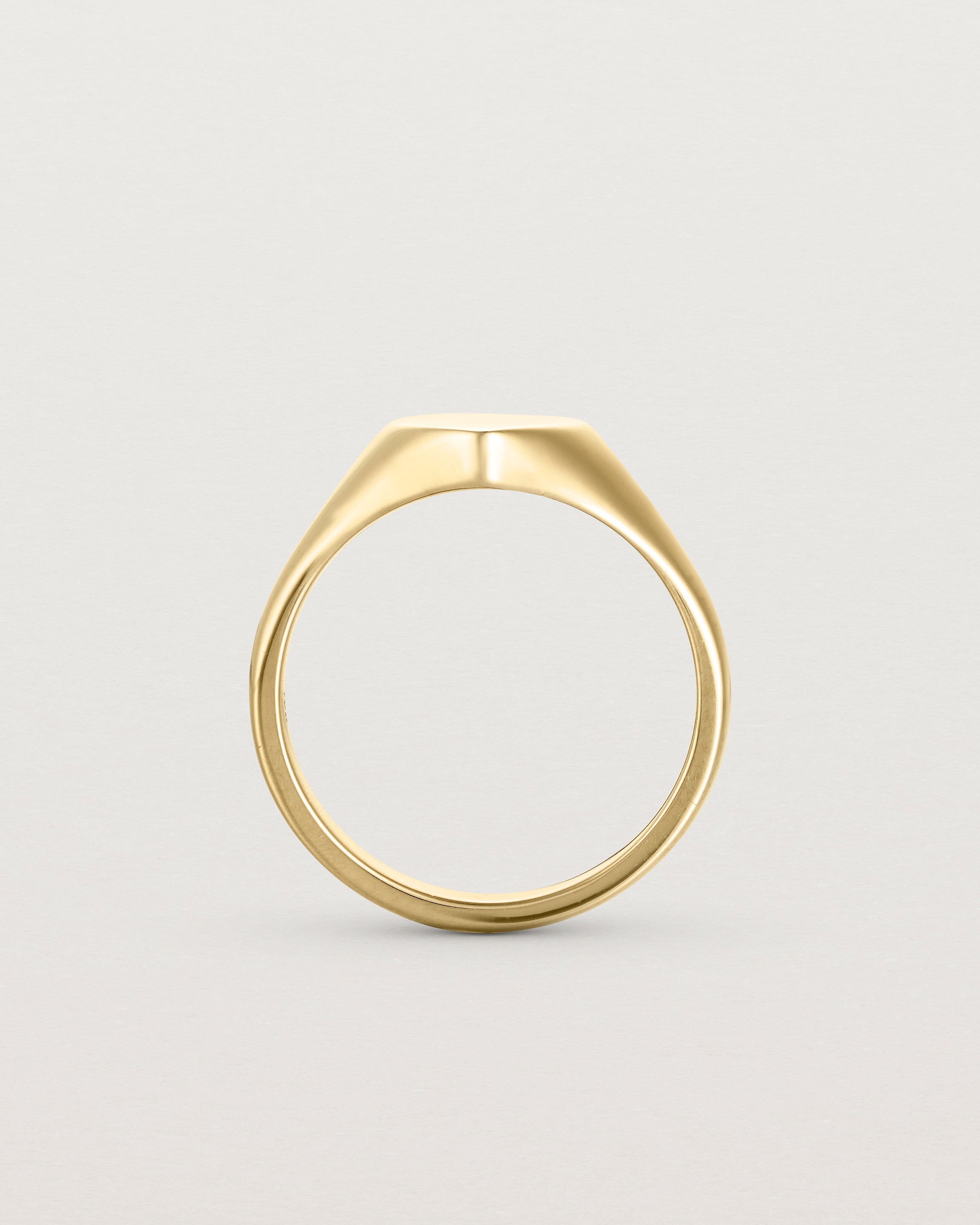 Standing view of the Willow Signet Ring in yellow gold.