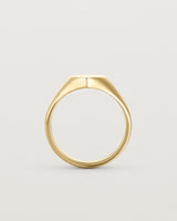 Standing view of the Willow Signet Ring in yellow gold.