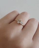 A video of the Skye Cluster Ring | Diamonds in yellow gold on hand.