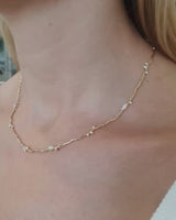 Video of Model wearing the demi diamond ember necklace