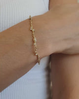 Video of model wearing Ember bracelet with diamonds