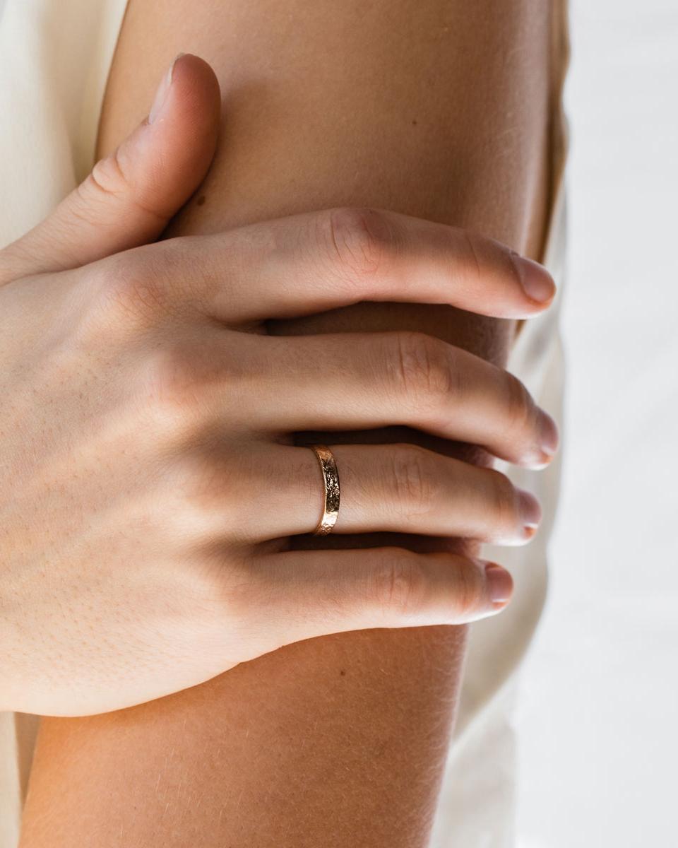 A woman wearing the the Naum Stacking Ring | Fine. 