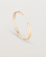 Standing view of the Ailing Cuff Bangle in Rose Gold.