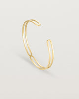 Standing view of the Ailing Cuff Bangle in Yellow Gold.
