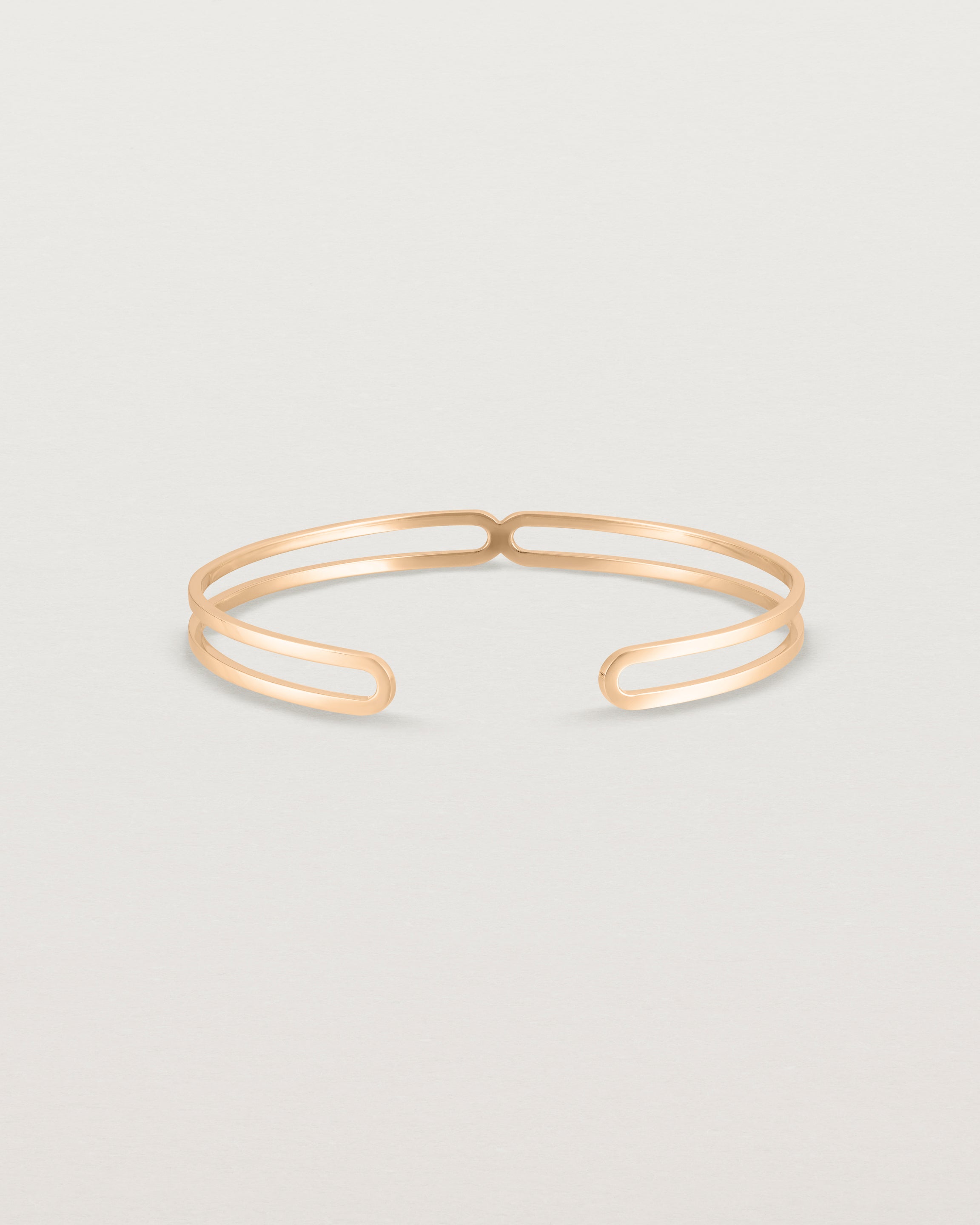 Front view of the Ailing Cuff Bangle in Rose Gold.