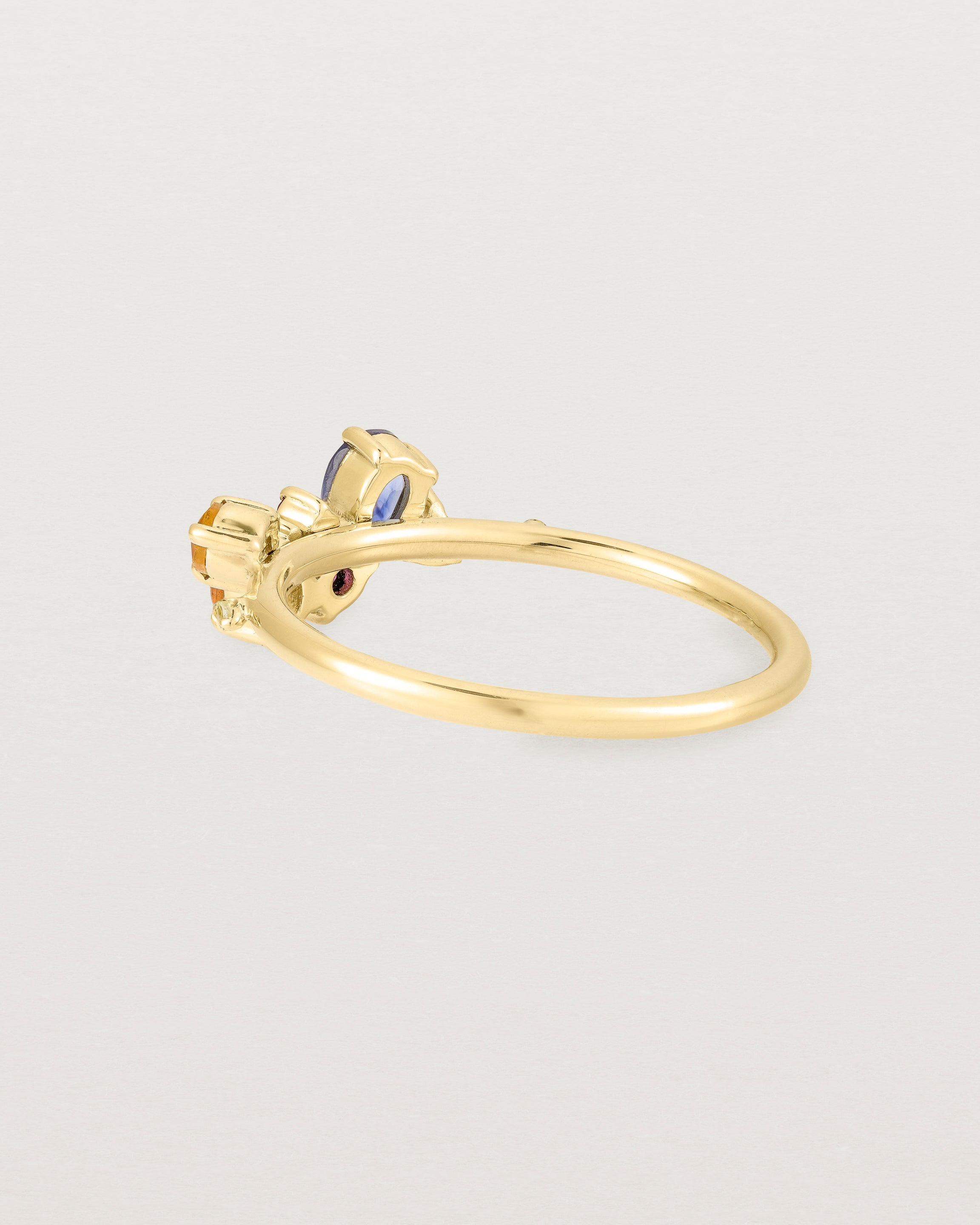 Yellow gold multi coloured precious stone ring