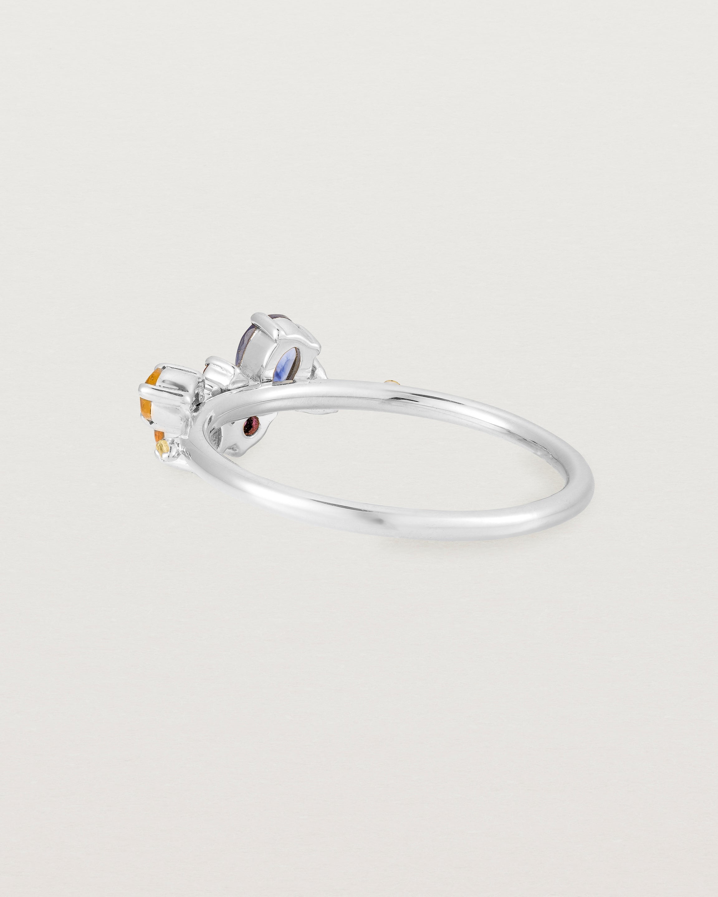 white gold multi coloured precious stone ring