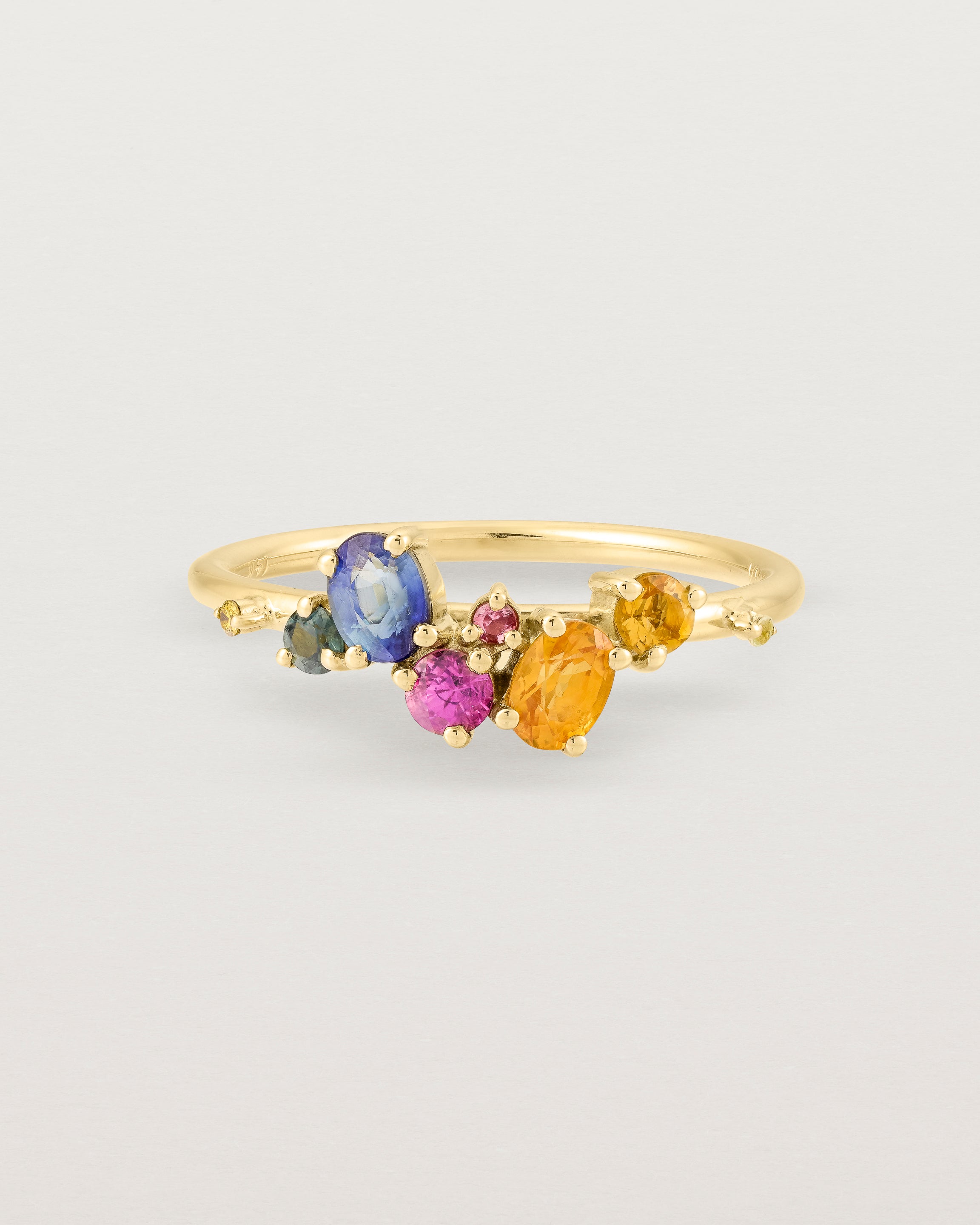 Yellow gold multi coloured precious stone ring