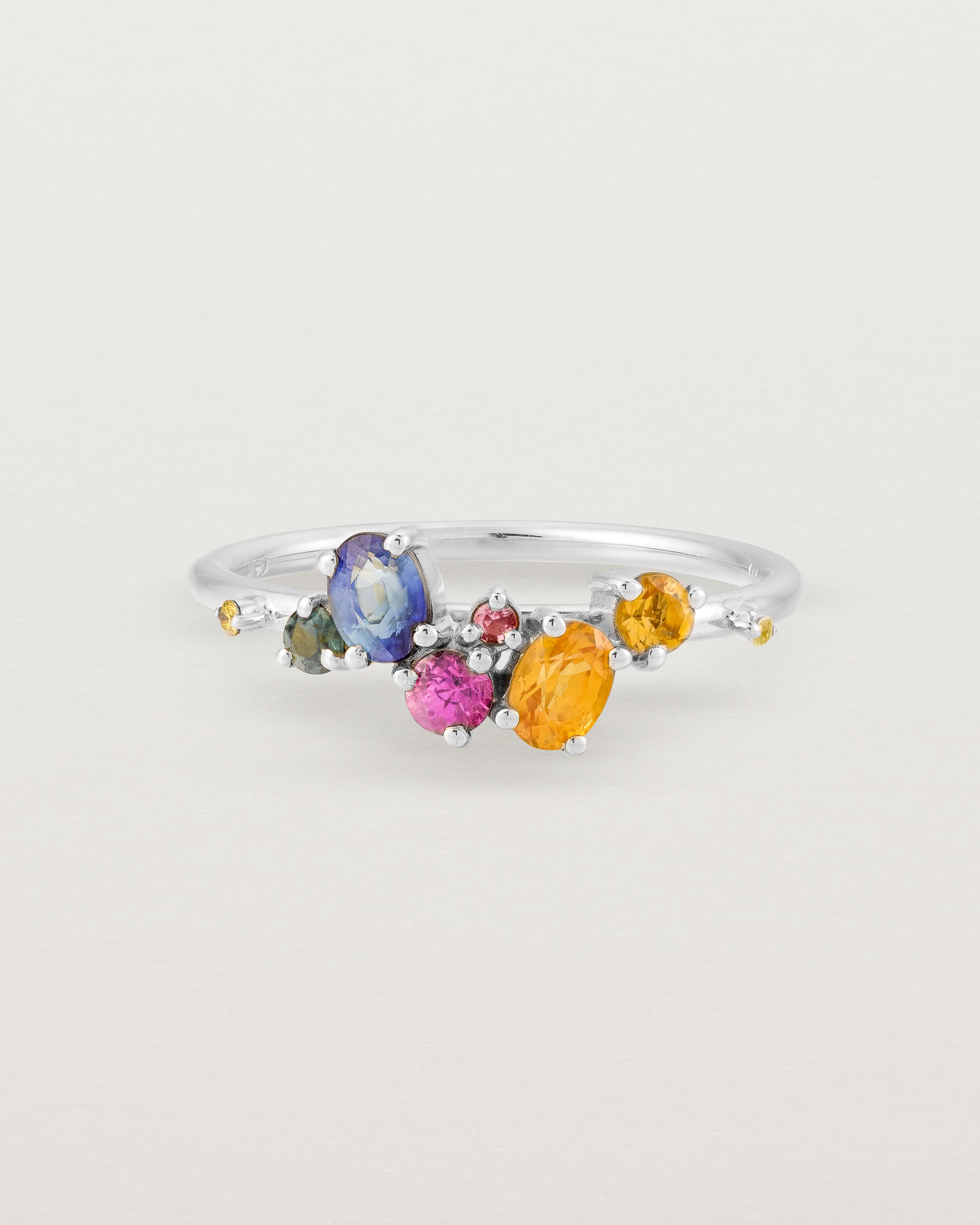 white gold multi coloured precious stone ring