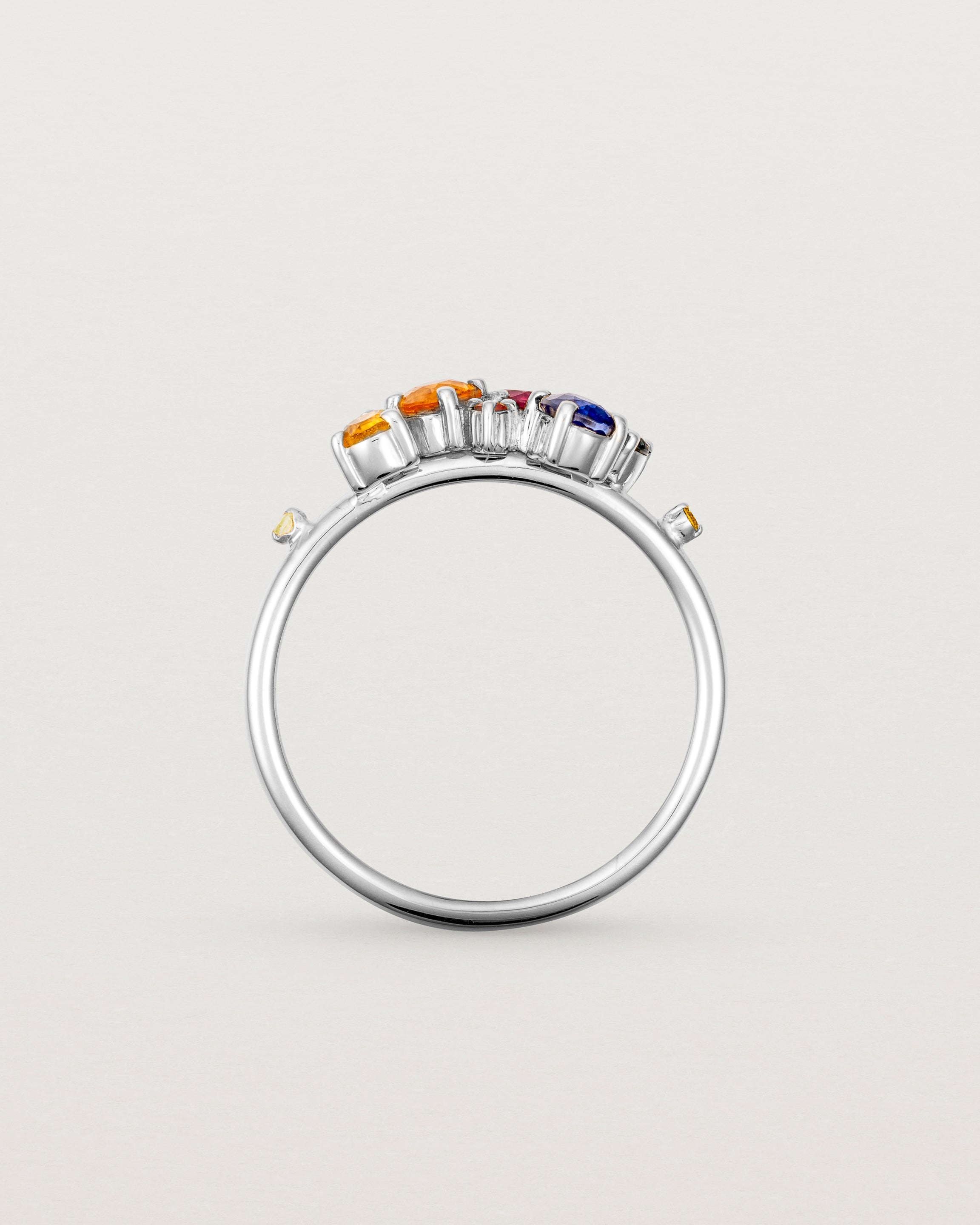 white gold multi coloured precious stone ring