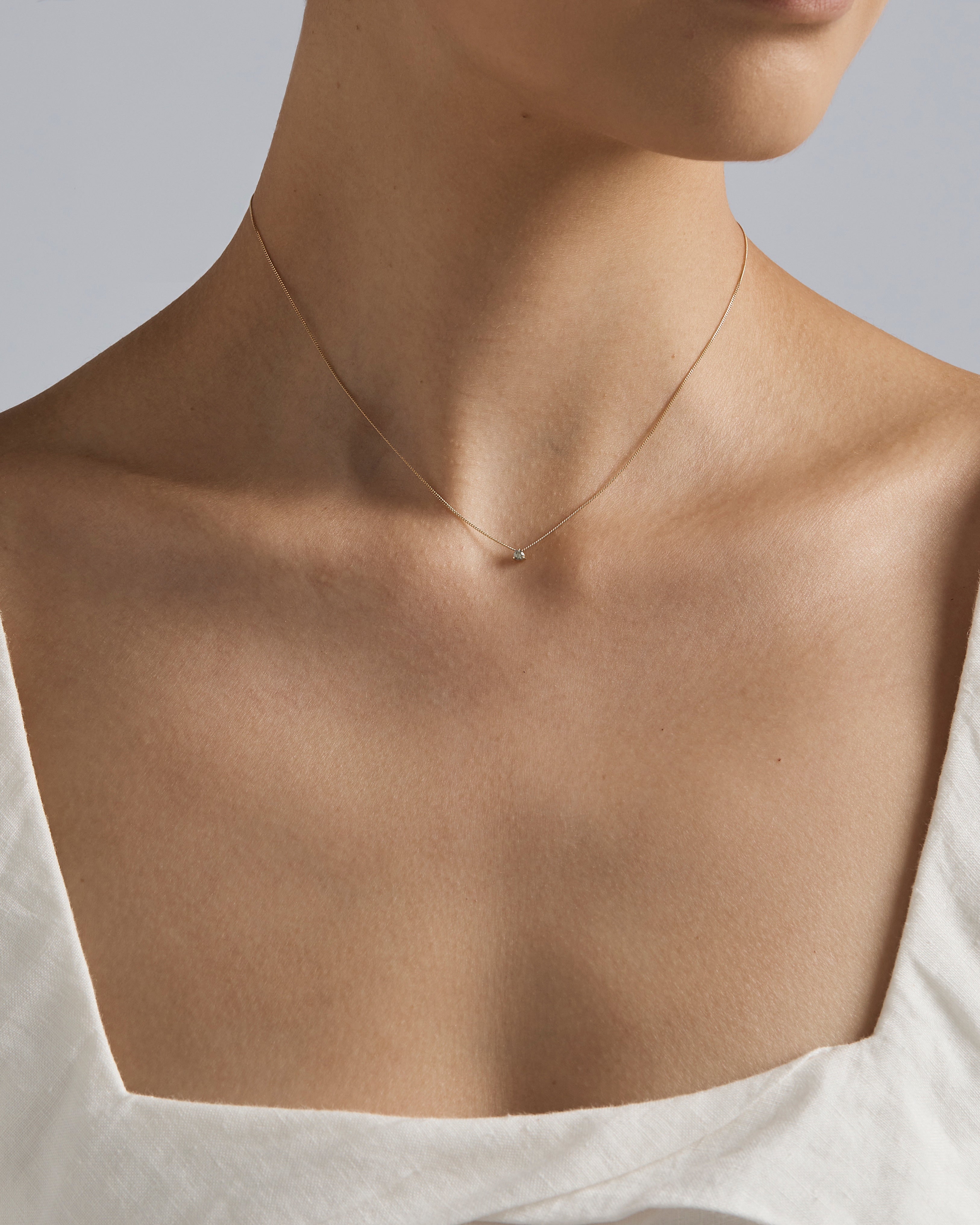 A woman wearing the Aiona Slider Necklace | Old Cut Diamond.
