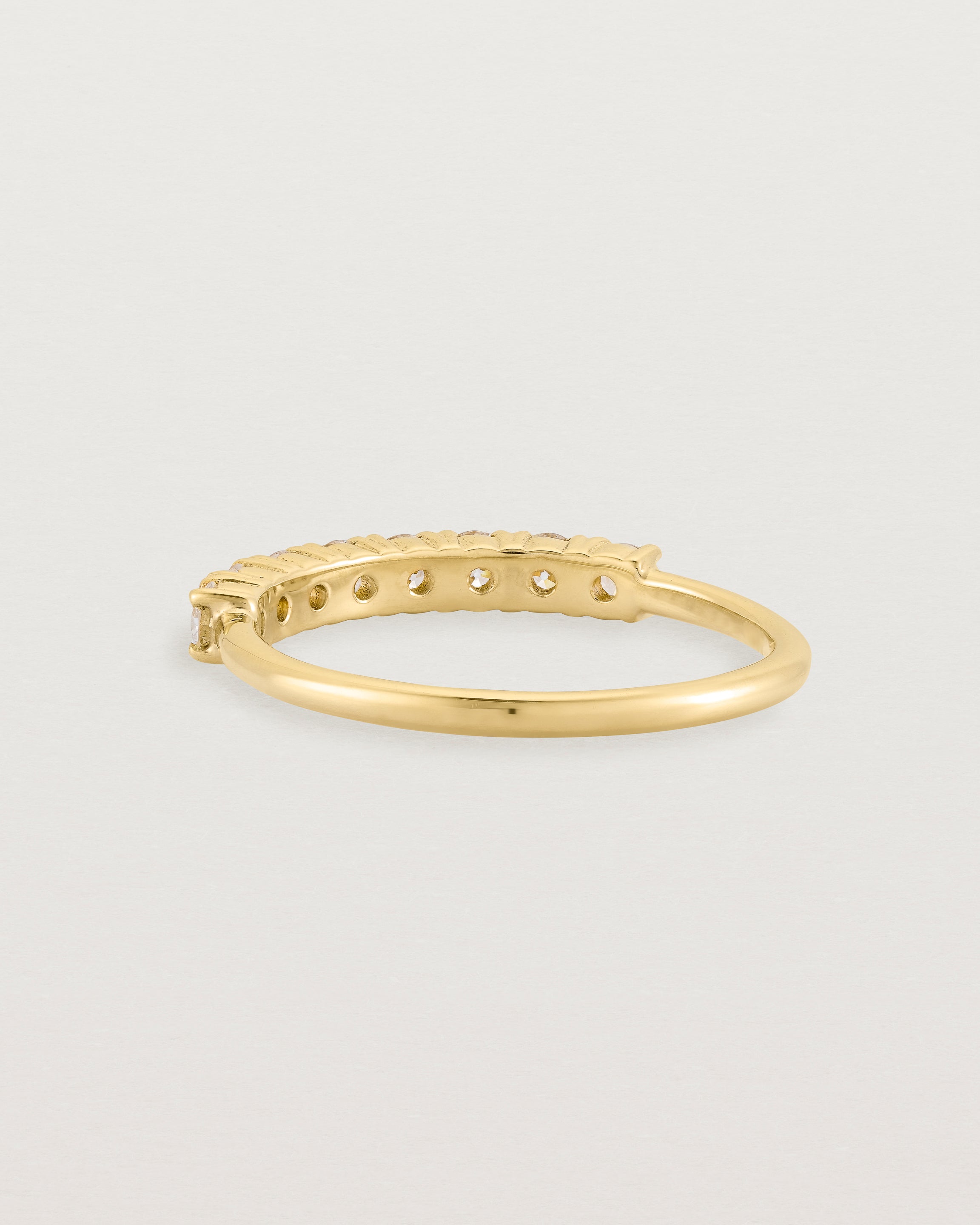 yellow Gold Diamond ring featuring seven white diamonds
