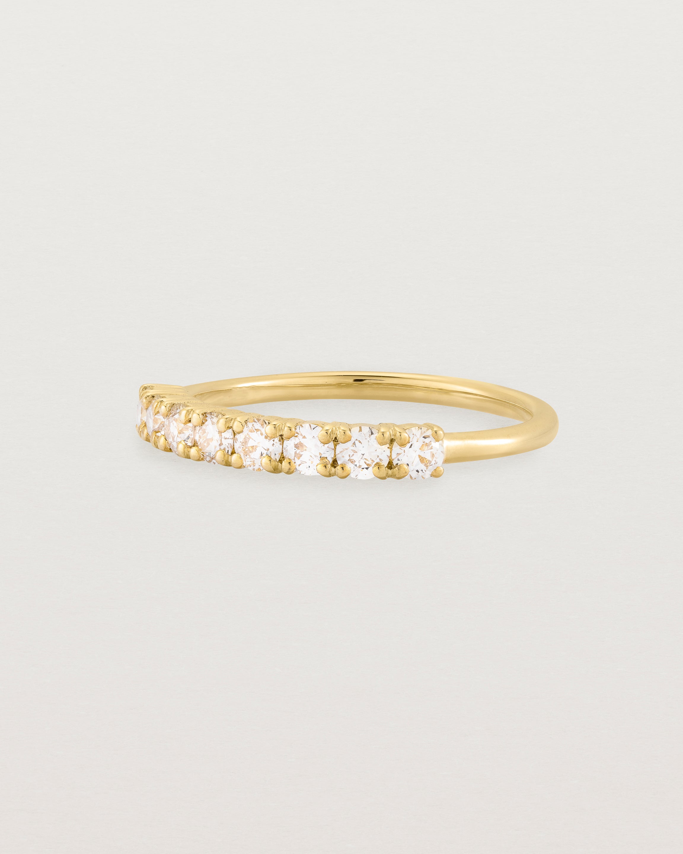 yellow Gold Diamond ring featuring seven white diamonds