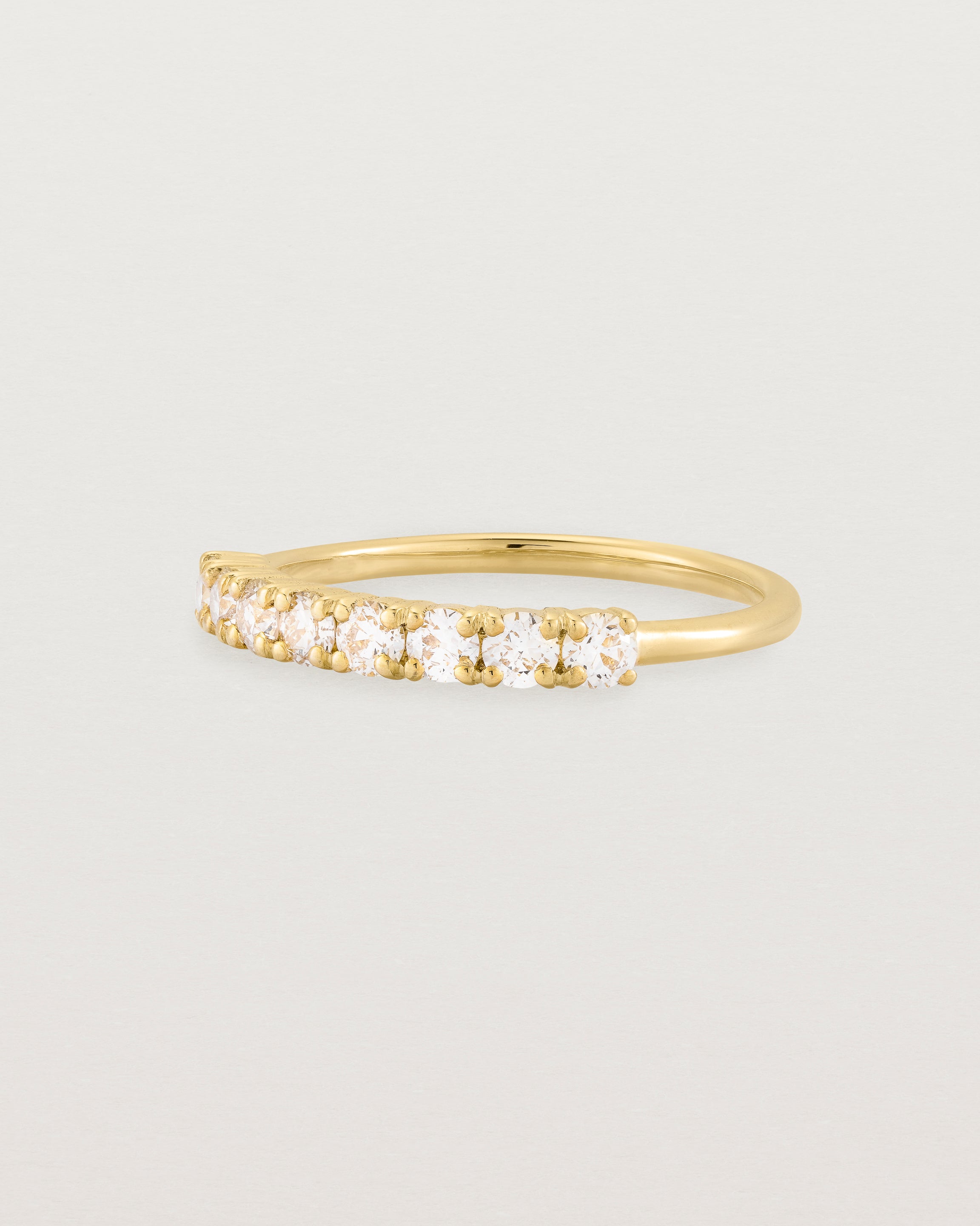 yellow Gold Diamond ring featuring seven white diamonds