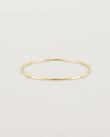 Front view of the Alya Bangle in Yellow Gold.