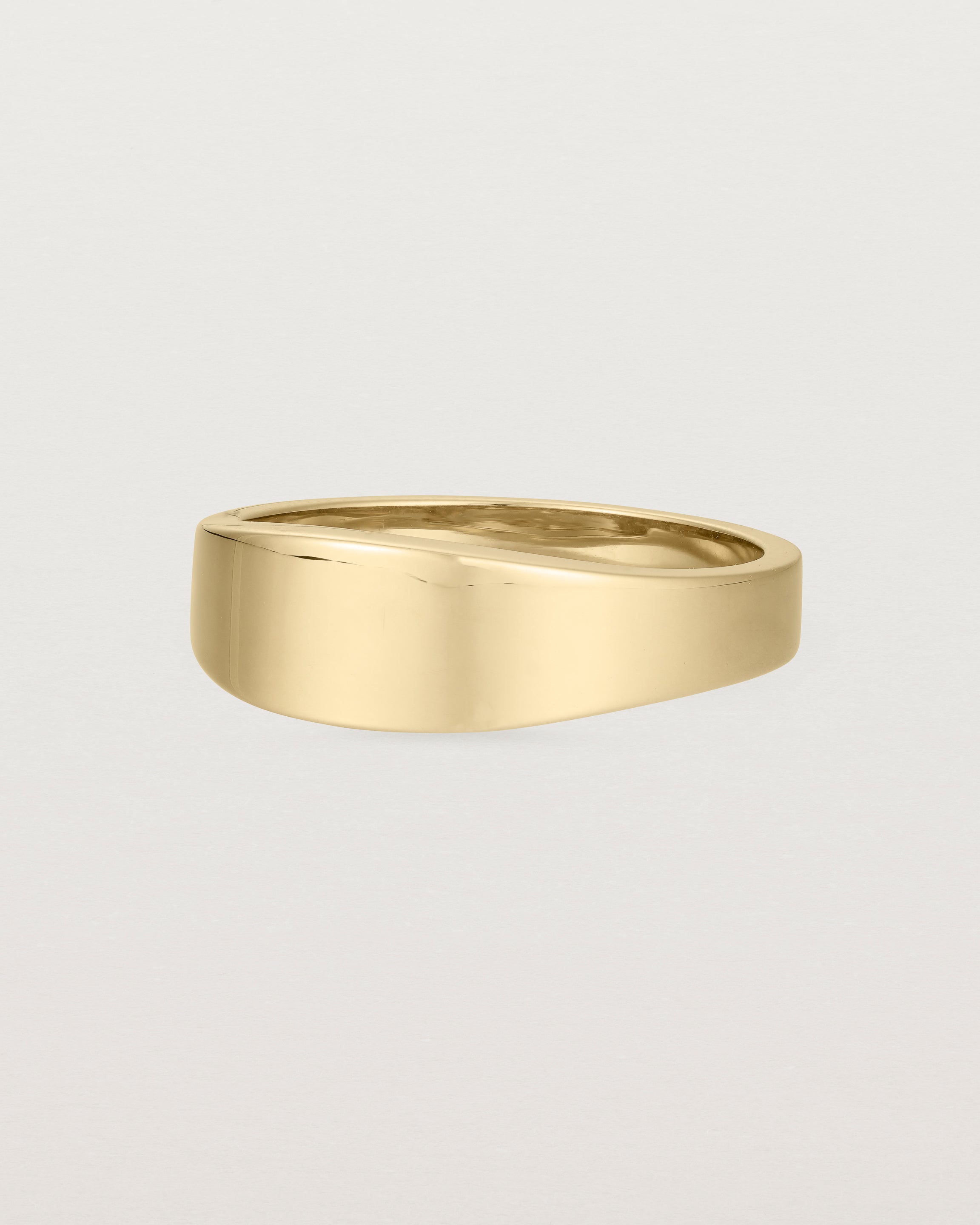 Angled view of the Amos Ring in Yellow Gold.