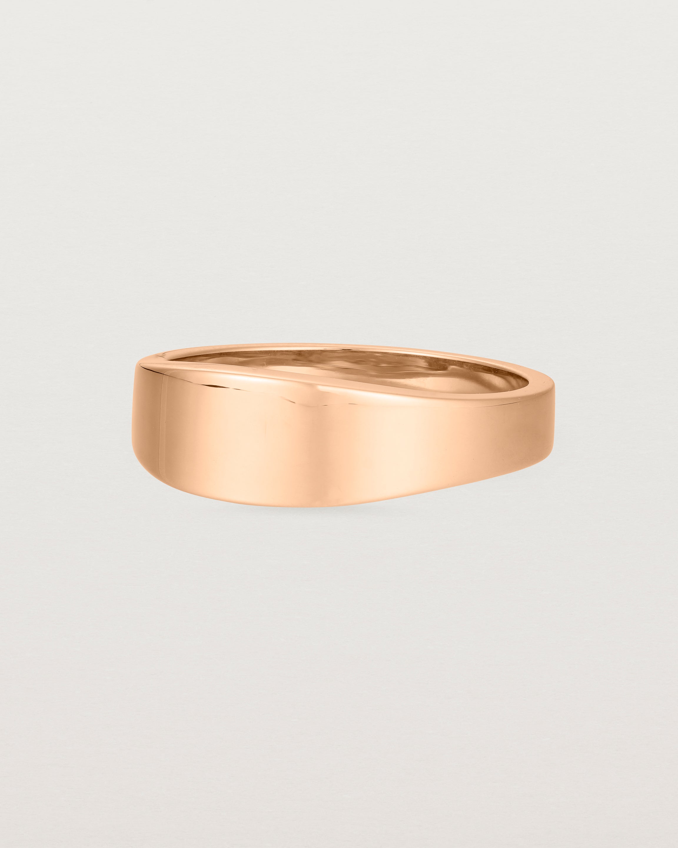Angled view of the Amos Ring in Rose Gold.