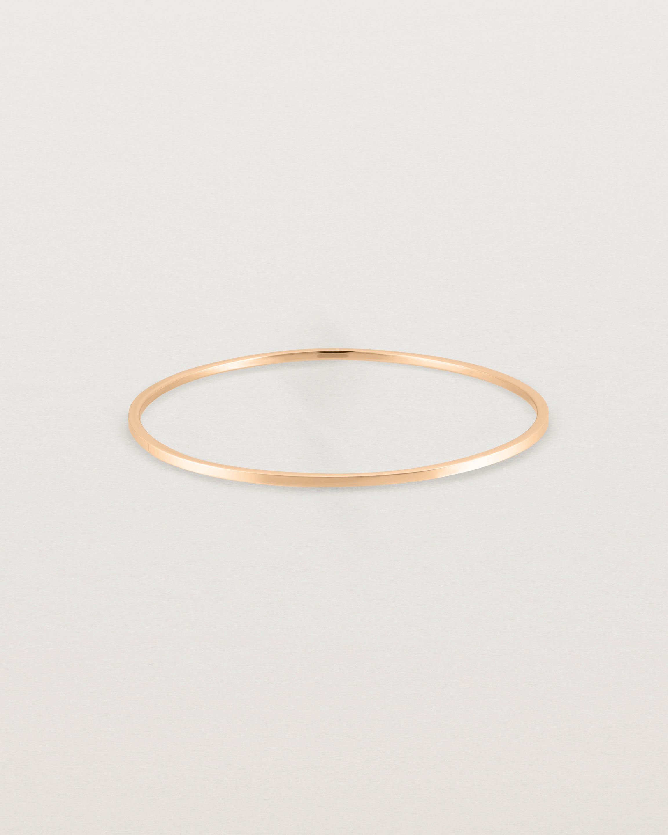 Front view of the Antares Bangle in Rose Gold.