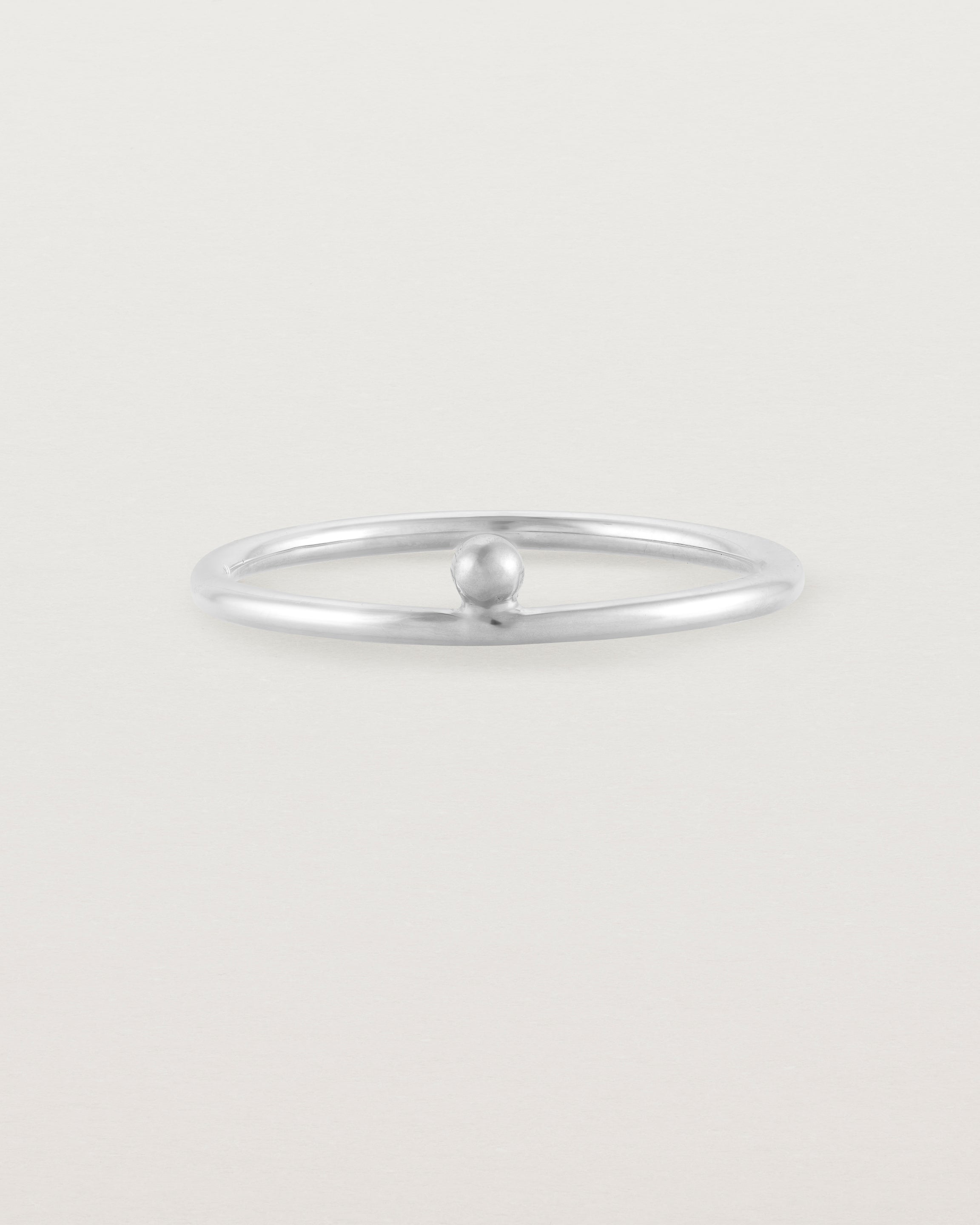 Silver fine ring with a single dot detail