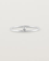 Silver fine ring with a single dot detail