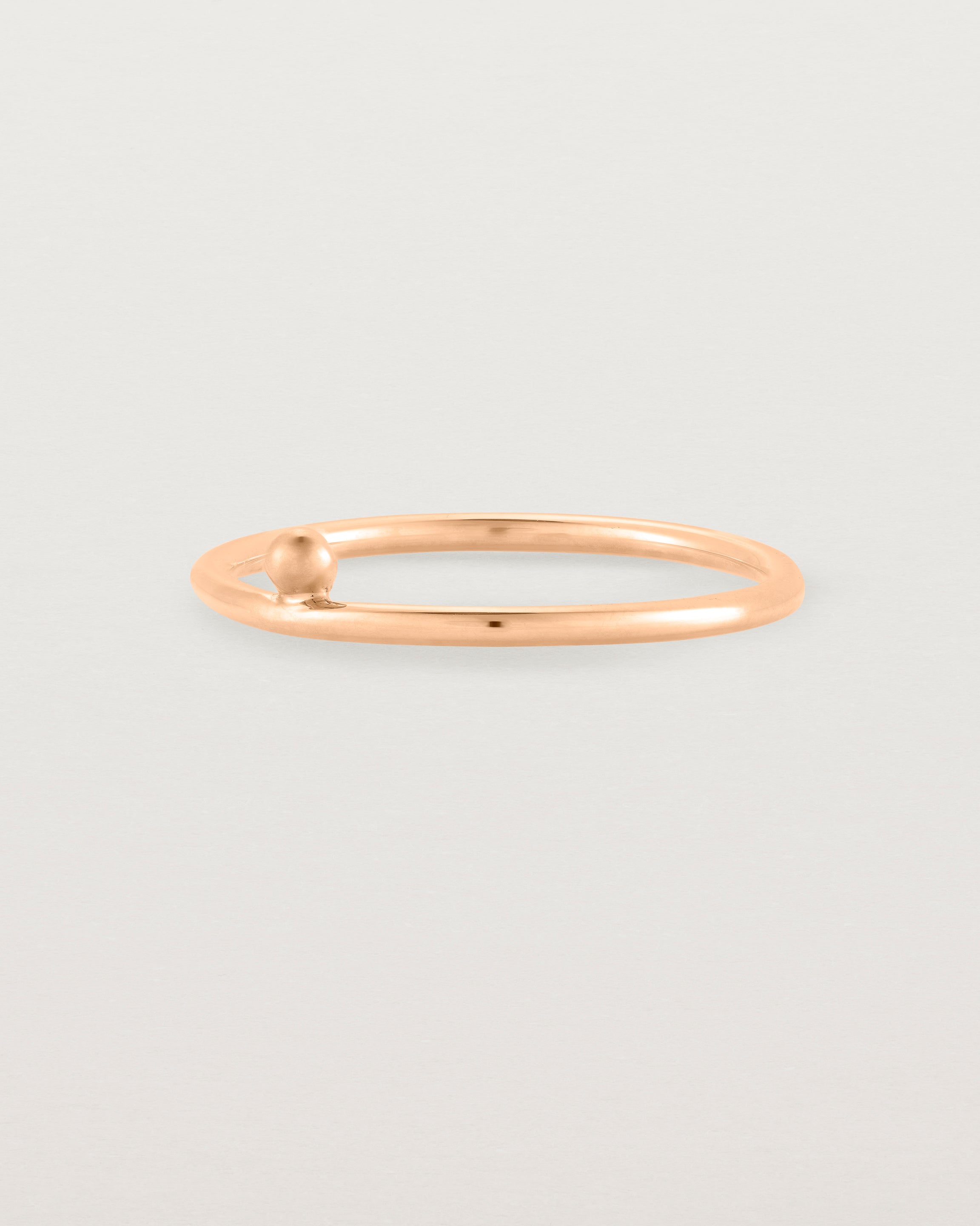 rose gold fine ring with a single dot detail