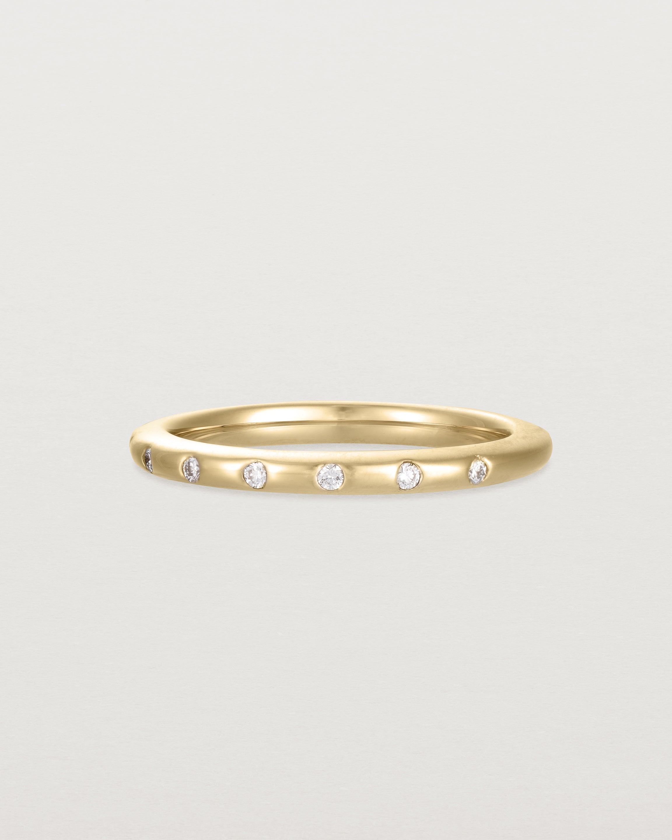 Angled view of Bold Curve Ring | 2mm | Diamonds | Yellow Gold.