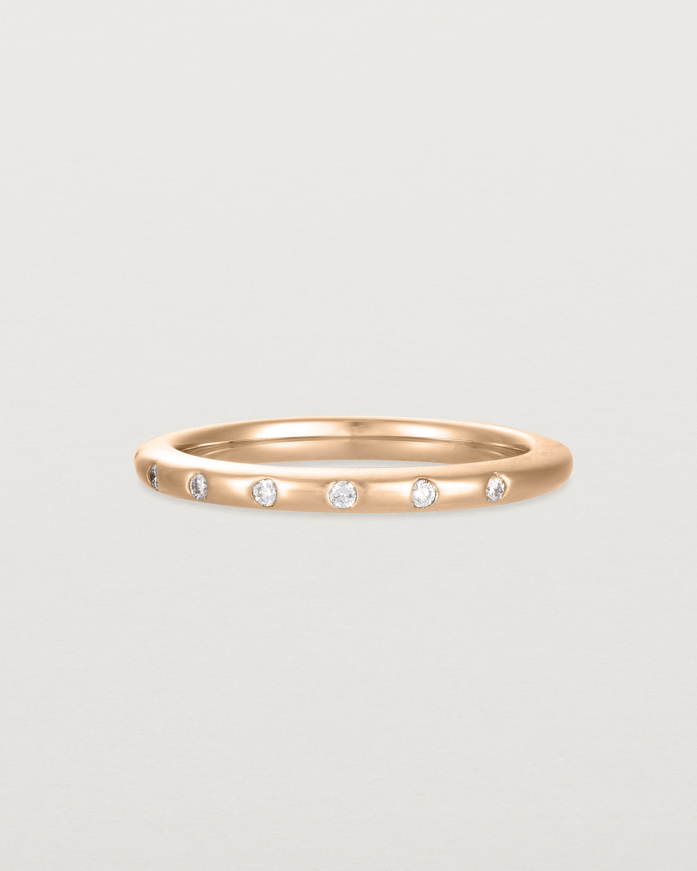 Angled view of Bold Curve Ring | 2mm | Diamonds | Rose Gold.