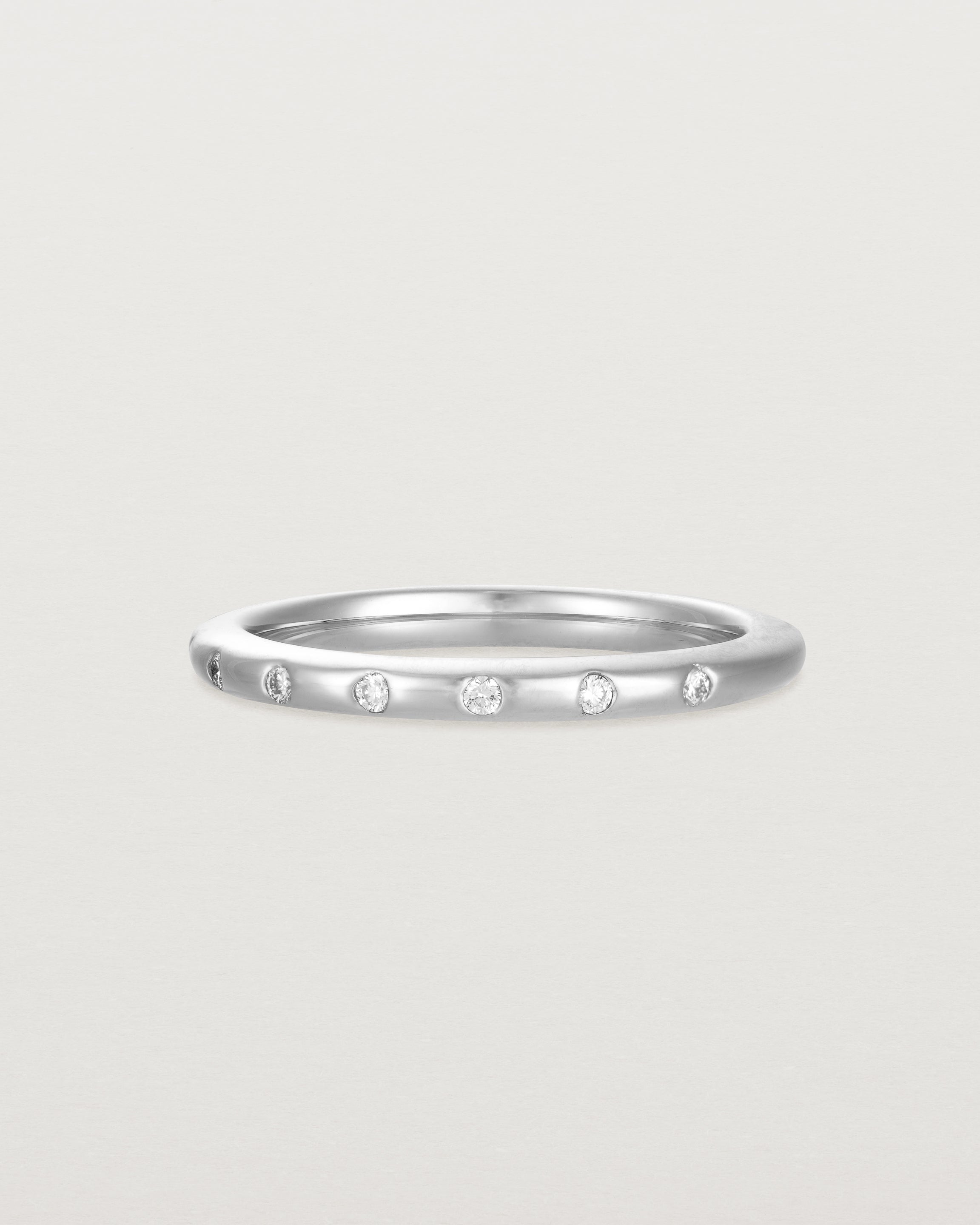 Angled view of Bold Curve Ring | 2mm | Diamonds | White Gold.
