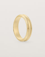 Standing view of the Border Wedding Ring | 5mm | Yellow Gold.