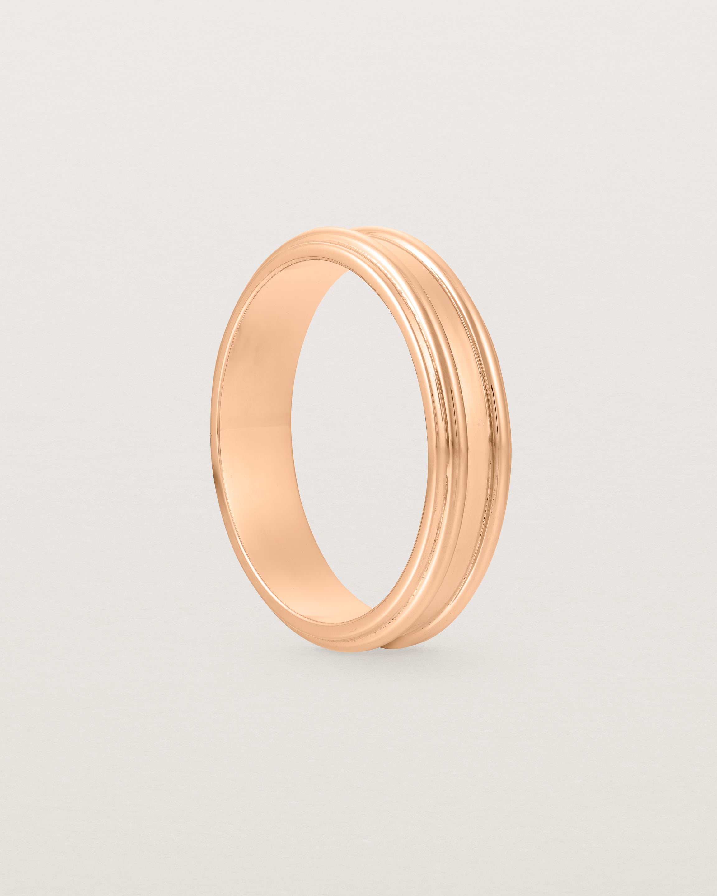 Standing view of the Border Wedding Ring | 5mm | Rose Gold.