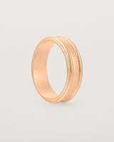 Standing view of the Border Wedding Ring | 6mm | Rose Gold.