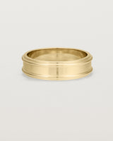 Front view of the Border Wedding Ring | 6mm | Yellow Gold.