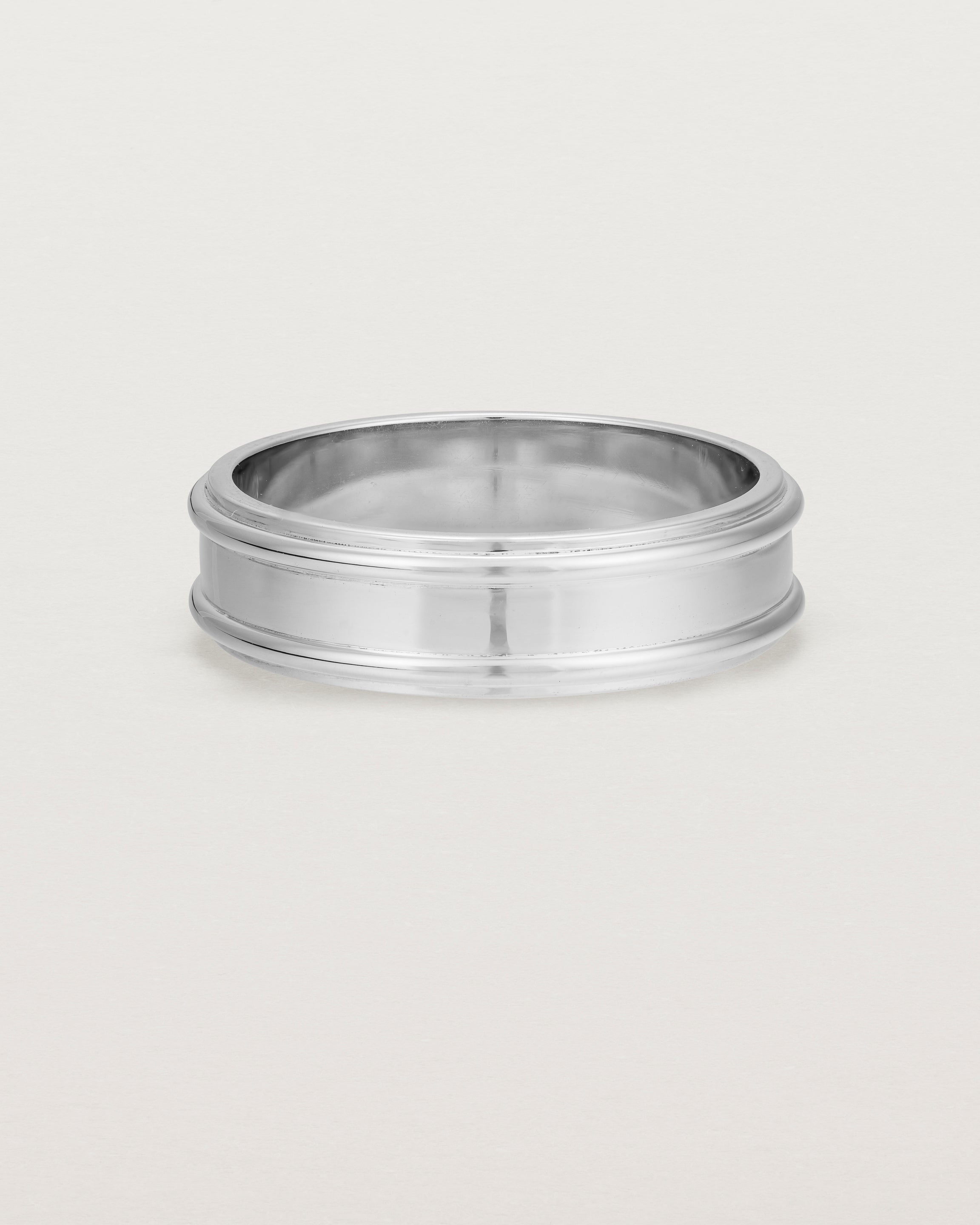 Front view of the Border Wedding Ring | 6mm | White Gold.