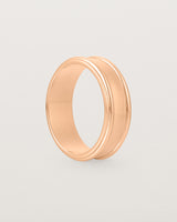 Standing view of the Border Wedding Ring | 7mm | Rose Gold.
