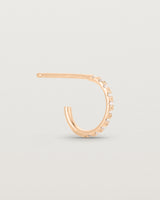 A single of the Cascade Hoops | Diamonds | Rose Gold