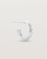 A side view of the Cascade Knife Edge Hoops | Diamonds | White Gold.