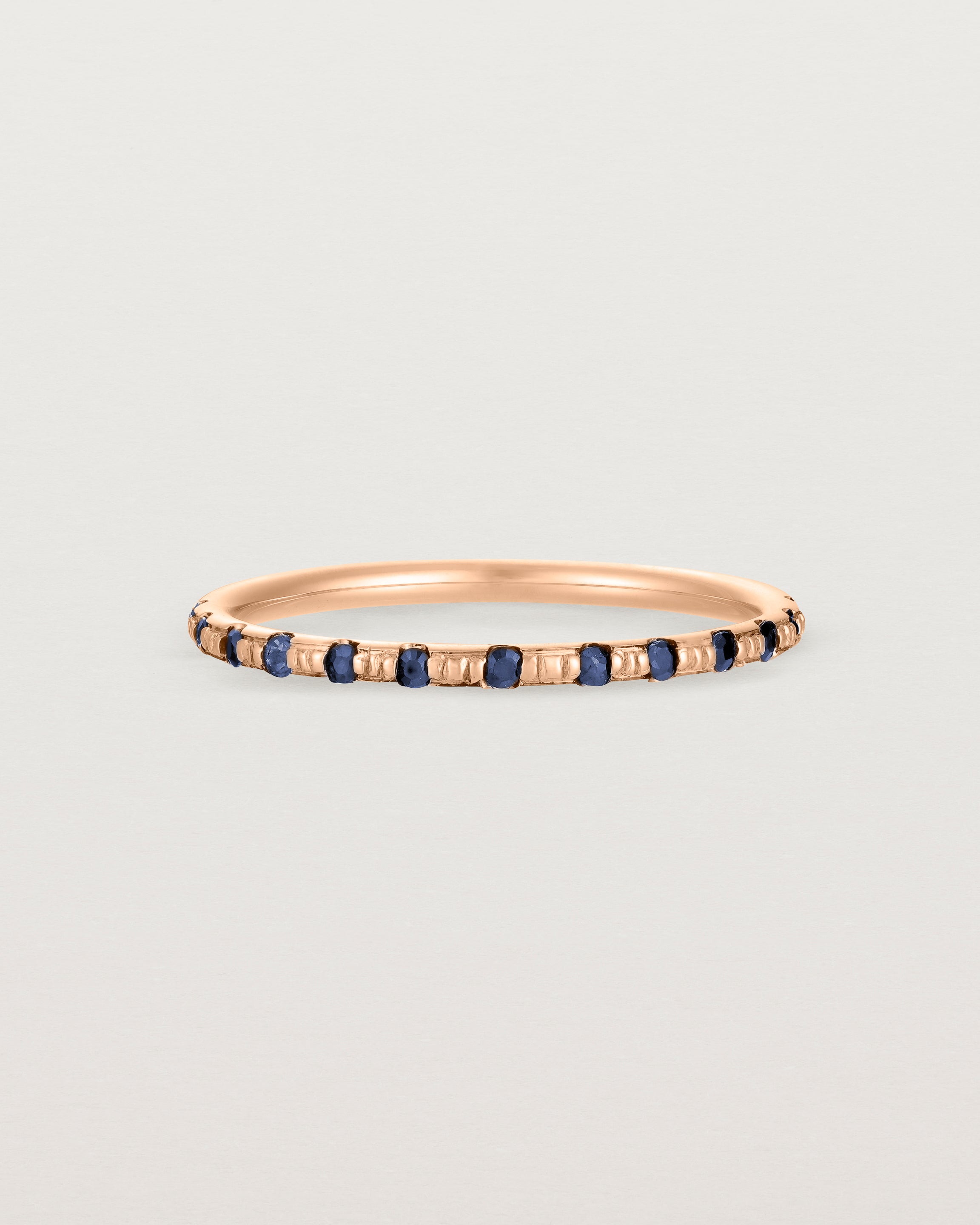 Front View of Cascade Round Profile Wedding Ring | Sapphire | Rose Gold