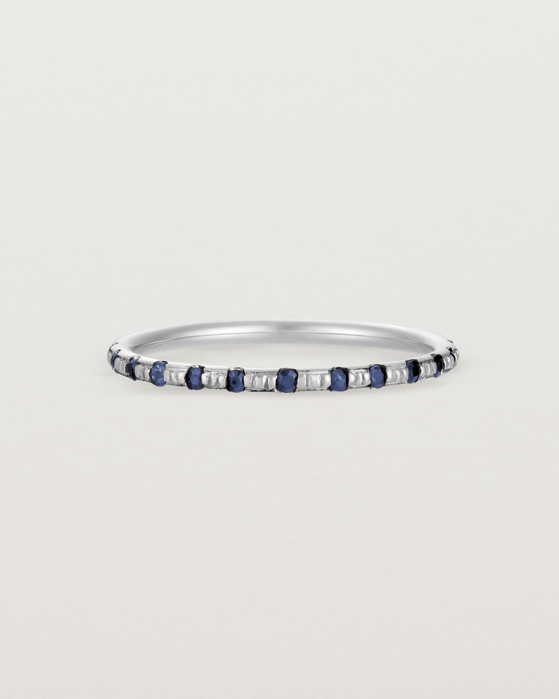 Front View of Cascade Round Profile Wedding Ring | Sapphire | White Gold 