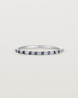 Angled View of Cascade Round Profile Wedding Ring | Sapphire | White Gold 
