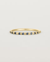 Side View of Cascade Round Profile Wedding Ring | Sapphire | Yellow Gold 