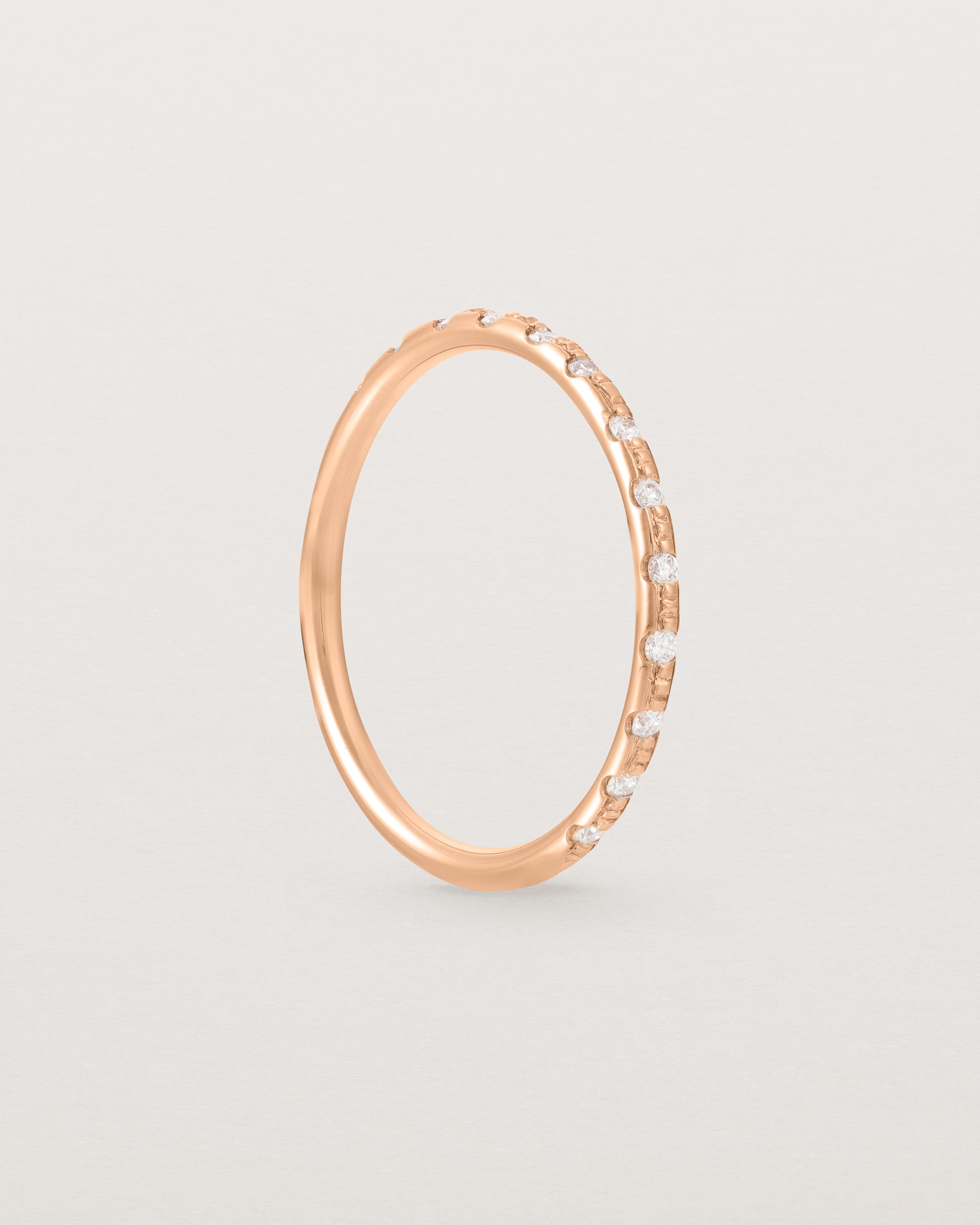 Standing View of Cascade Round Profile Wedding Ring | Diamonds | Rose Gold