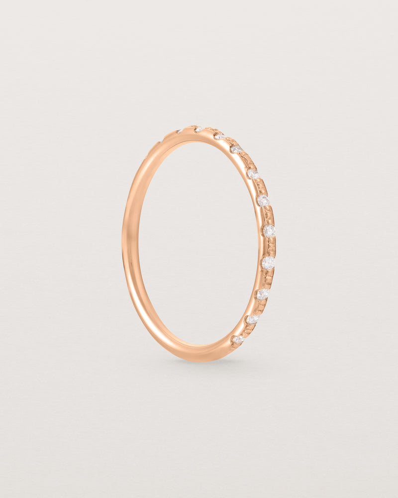 Standing View of Cascade Round Profile Wedding Ring | Diamonds | Rose Gold