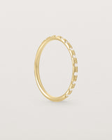 Standing View of Cascade Round Profile Wedding Ring | Diamonds | Yellow Gold